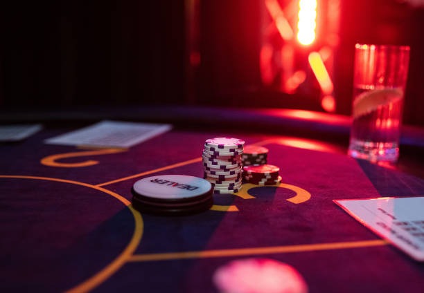 atoto app showing live baccarat dealer feed and account balance on mobile screen